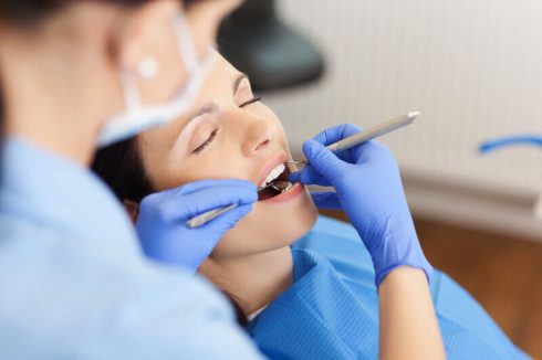 dentist rebuilding gum and teeth