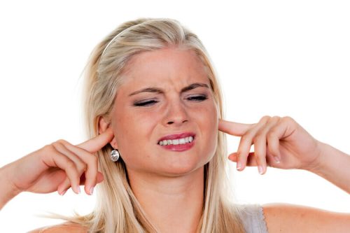 woman suffer tinnitus